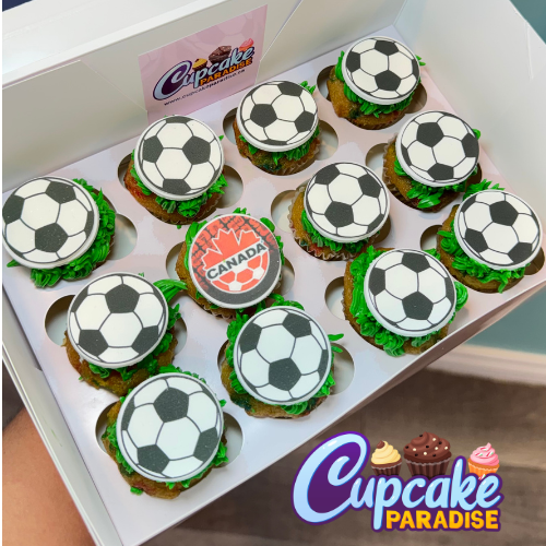 Box of 24 Soccer Themed Mini Cupcakes with edible soccer ball toppers and green buttercream frosting from Cupcake Paradise Toronto.